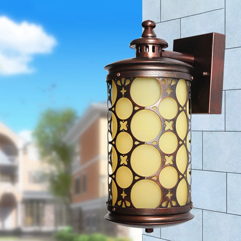 Applique murale cylindrique rurale en verre jaune à lumière unique en bronze avec motif circulaire Clearhalo