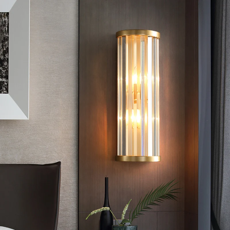 Applique murale moderne et élégante en métal, 2 lumières, cylindre, avec tuyau en cristal, finition dorée Clearhalo