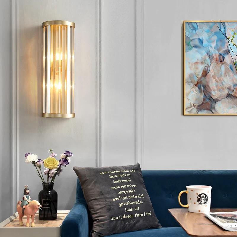 Applique murale moderne et élégante en métal, 2 lumières, cylindre, avec tuyau en cristal, finition dorée Clearhalo