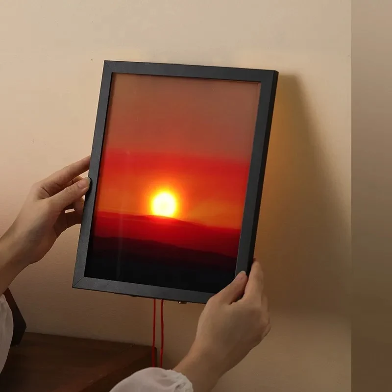 Lampe murale LED effet coucher de soleil