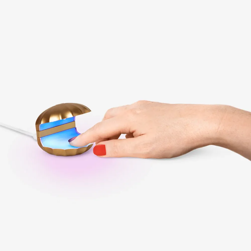 Lampe à ongles coque dorée