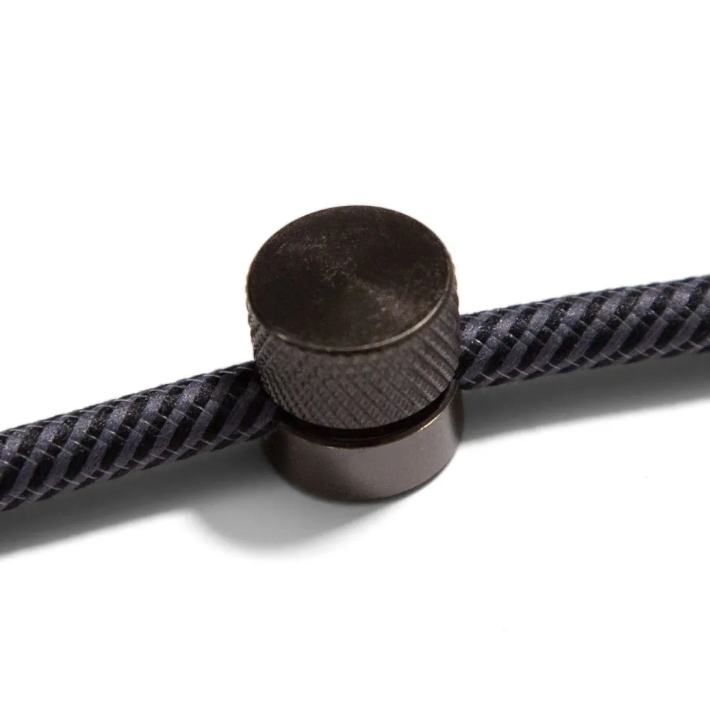 Sarè - Fixation murale, passe-câble en métal pour câble textile - Noir perle
