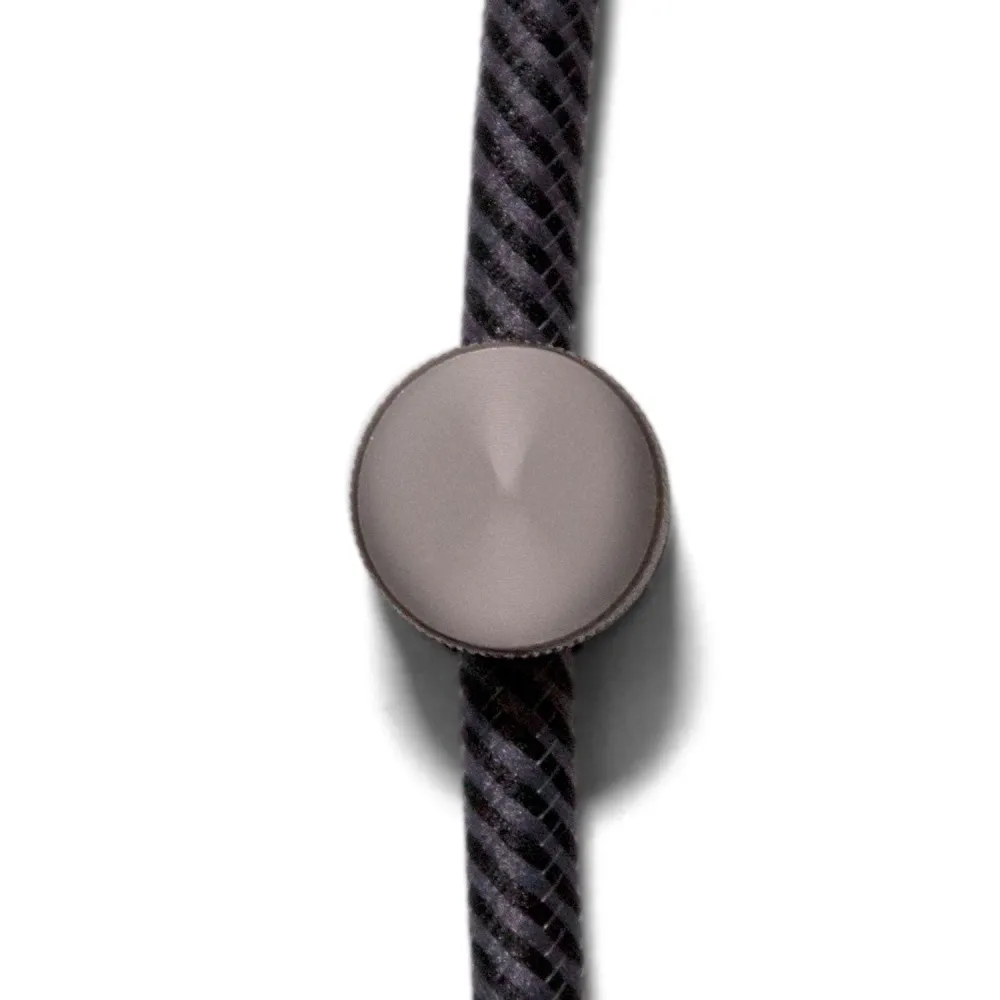 Sarè - Fixation murale, passe-câble en métal pour câble textile - Noir perle